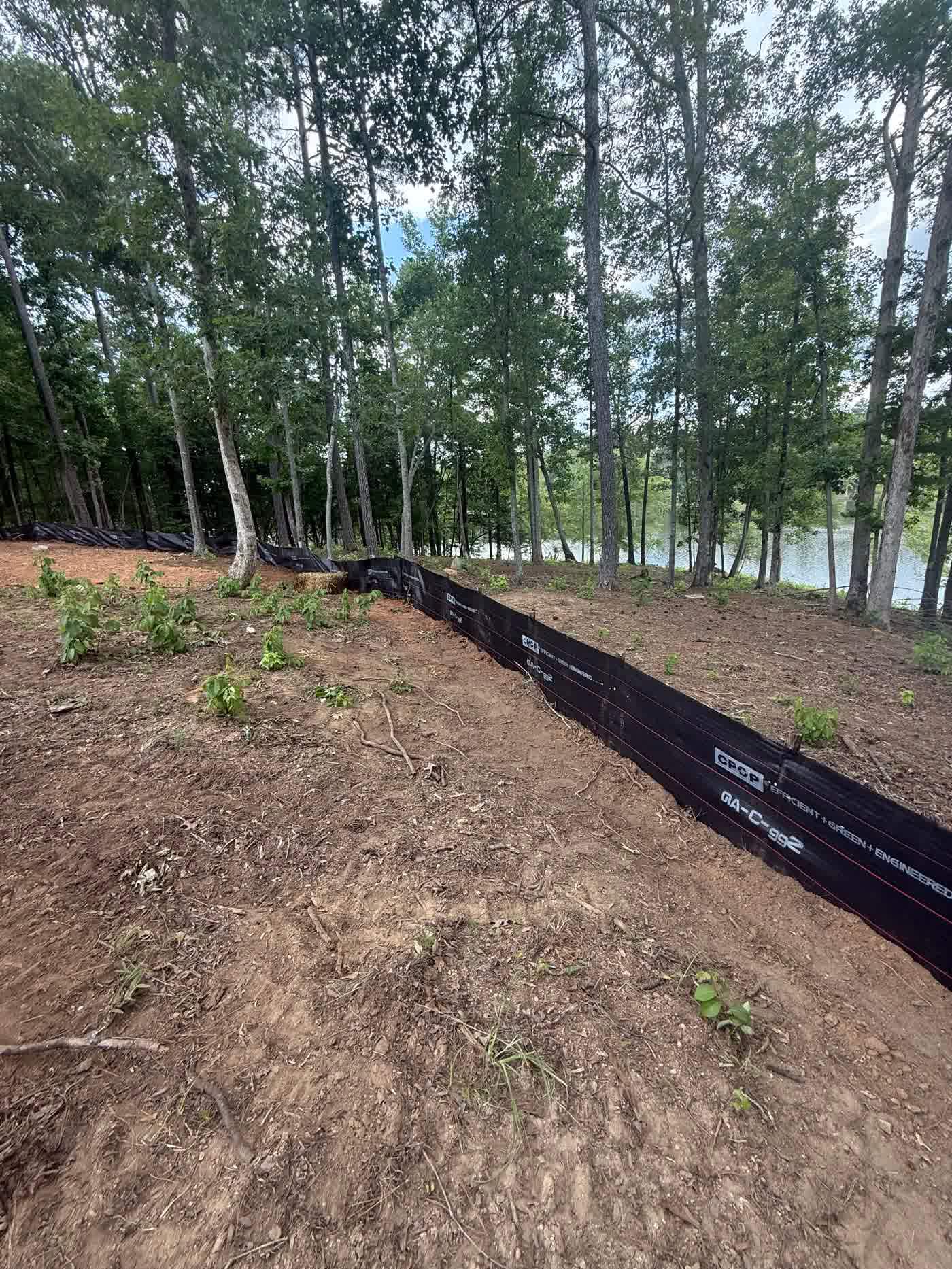 Silt fence installed along a freshly graded slope