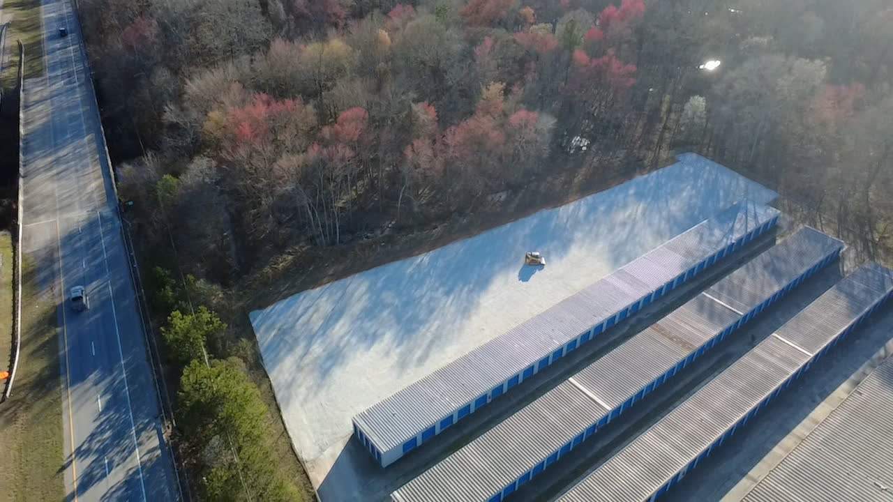 Aerial view of a finished gravel lot at a storage facility