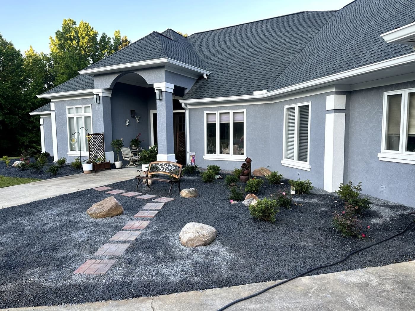 Finished landscape bed and stone entry